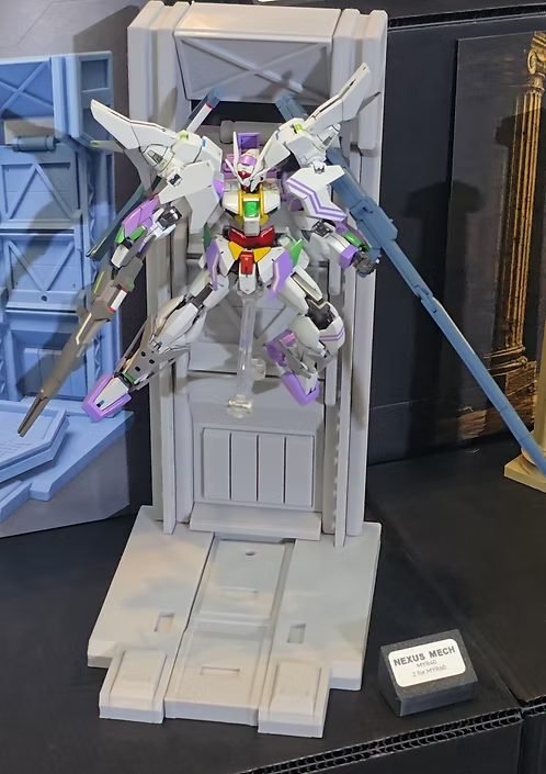 Studio Toki Nexus Base with a Gunpla on display